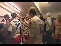 rugby guys changing in locker room