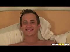 Twink playing with a glass dildo